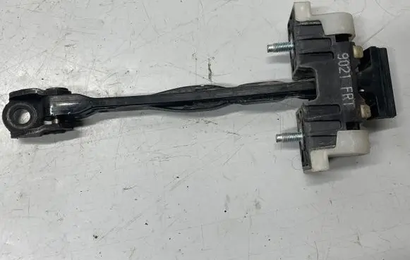 Front door check strap stopper