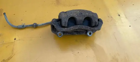 Nissan Primastar Front brake caliper 4100100QAF