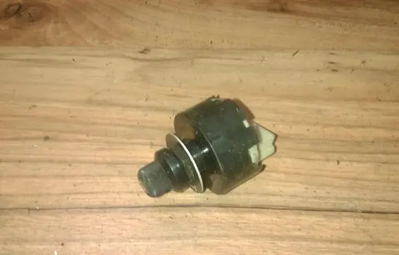 Mitsubishi Lancer Headlight level height control switch