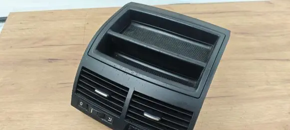 Volkswagen Touareg I Rear air vent grill 7L6857923