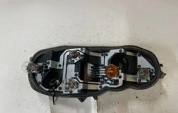 Opel Corsa D Tail light bulb cover holder 89037852A
