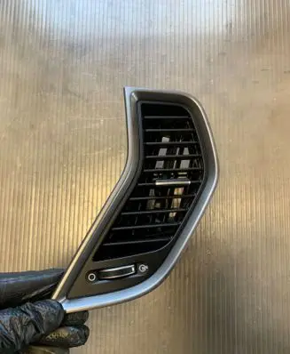 Hyundai Santa Fe Dash center air vent grill 974202W000