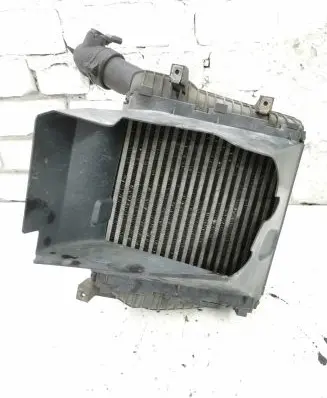 Volkswagen Touareg I Intercooler radiator 7L6117335
