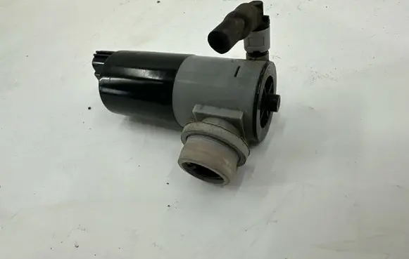 Volvo V40 Headlight washer pump 1019873