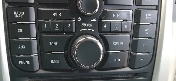 Opel Astra J Central console control unit 