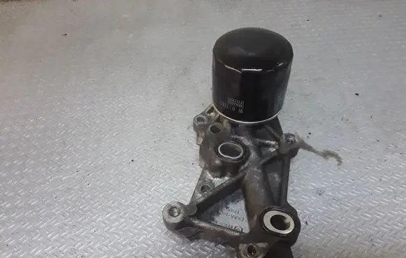 Mazda CX-7 Oil filter mounting bracket R2AA14311