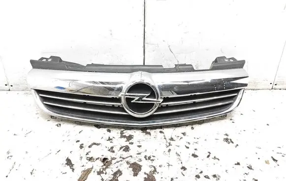 Opel Zafira B Front bumper upper radiator grill 13247331