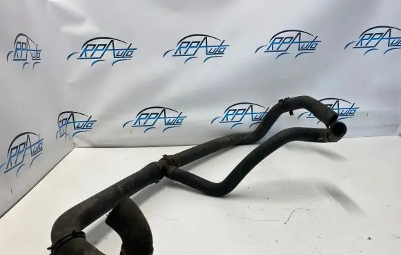 Volkswagen Touareg II Engine coolant pipe/hose 7m0121051