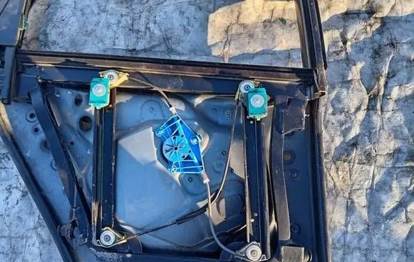 Sliding door window regulator with motor