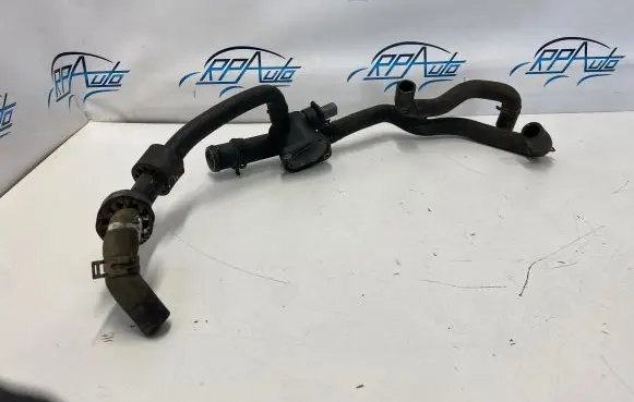 Volkswagen Touran I Engine coolant pipe/hose 038121132D