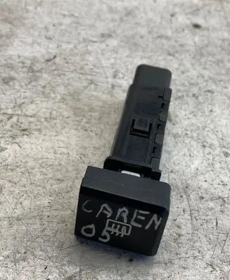 KIA Carens I Windscreen/window heater switch