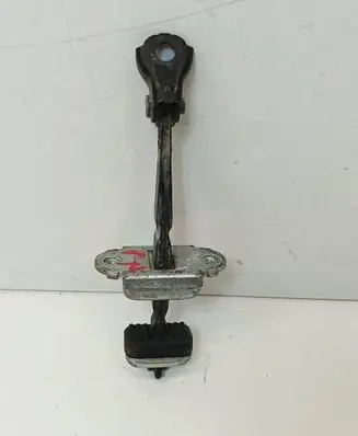 Front door check strap stopper