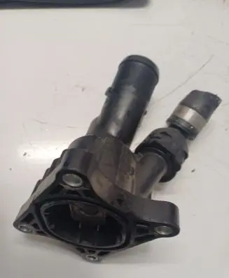 Thermostat/thermostat housing