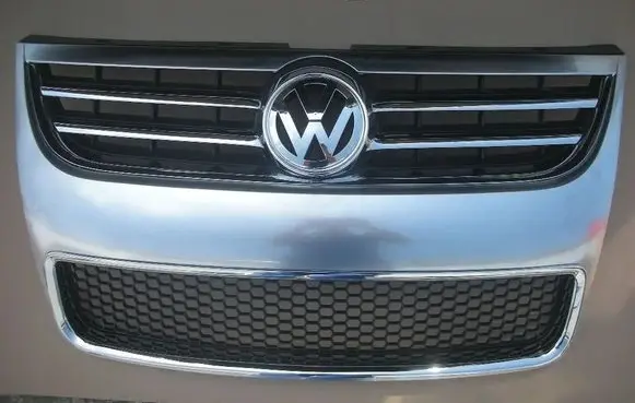Volkswagen Touareg I Front bumper upper radiator grill 7L6853651K