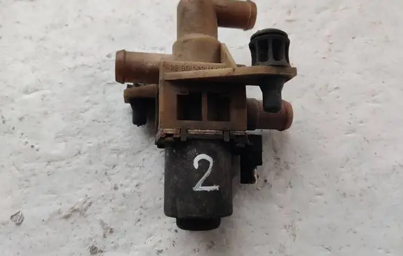 Coolant heater control valve