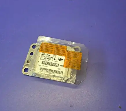 Nissan Micra Airbag control unit/module 0285001665