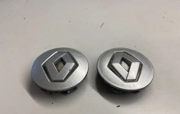 Renault Clio II Original wheel cap 7700418657B