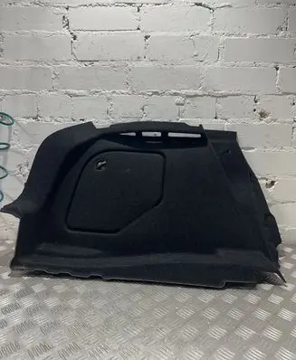 Trunk/boot lower side trim panel