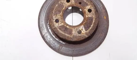 Nissan Almera N16 Rear brake disc neventiliuojamas
