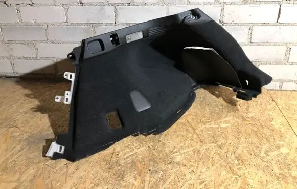 Trunk/boot lower side trim panel