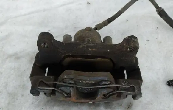Volkswagen PASSAT B7 Front brake caliper PA4309FE