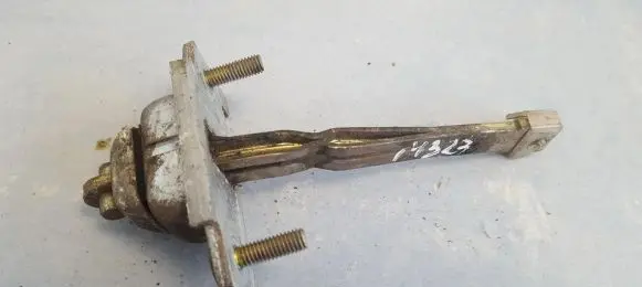 Mazda 323 Front door check strap stopper 