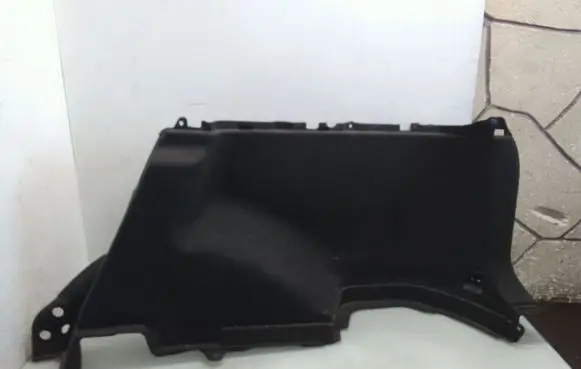 Trunk/boot side trim panel