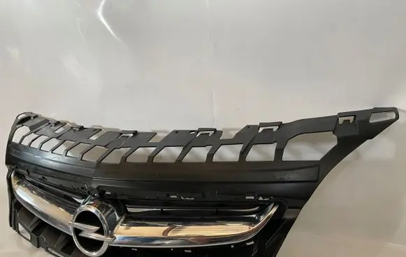 Opel Astra J Front bumper upper radiator grill 13368851