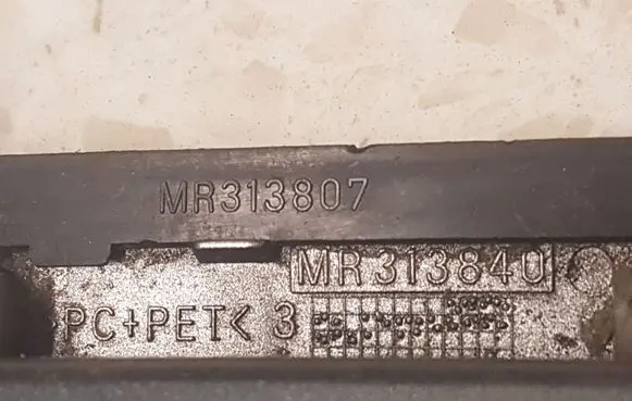 Mitsubishi Pajero Sport I Front door exterior handle MR313807 MR313840