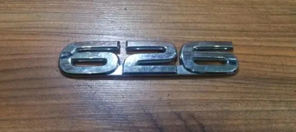 Mazda 626 Manufacturer badge logo/emblem 