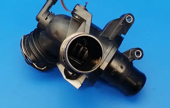 Thermostat/thermostat housing