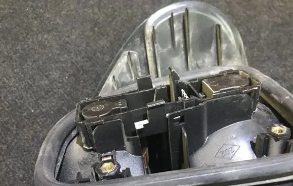 Renault Laguna I Tail light bulb cover holder