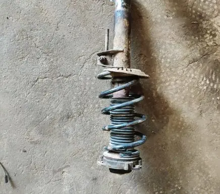 Volkswagen PASSAT B6 Front shock absorber with coil spring