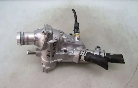 Thermostat/thermostat housing