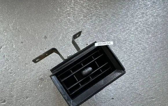 Nissan Patrol 260 Dashboard side air vent grill/cover trim 68750G9600