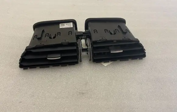 Jaguar XE Dash center air vent grill GX73014L21BD