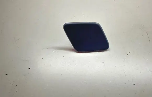 Headlight washer spray nozzle cap/cover