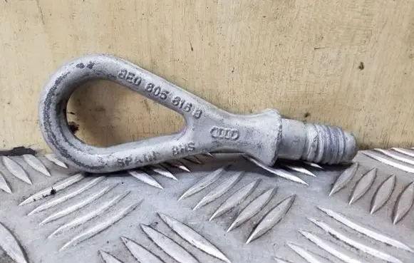 Towing hook eye