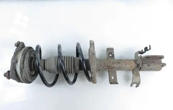 Renault Clio III Front shock absorber with coil spring