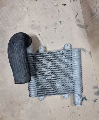 KIA Carens I Intercooler radiator 2827127350