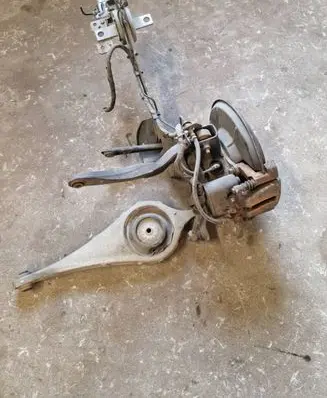 Rear wheel hub spindle/knuckle