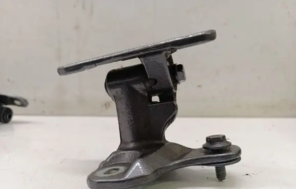Front door lower hinge