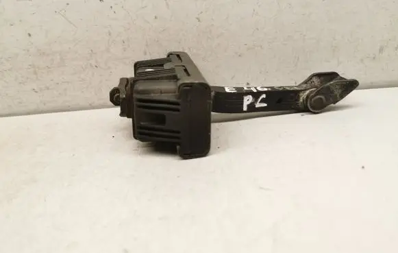 Front door check strap stopper