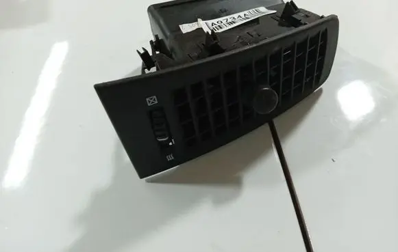 Dash center air vent grill