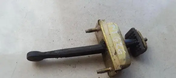 Mazda 626 Rear door check strap stopper