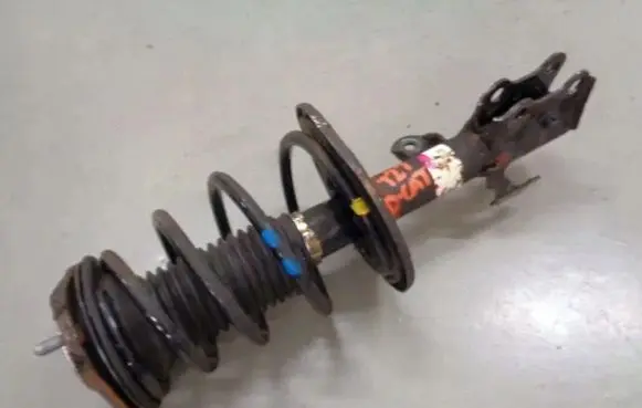 Toyota Avensis T270 Front shock absorber with coil spring