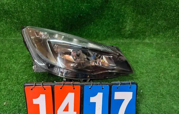 Opel Astra J Headlight/headlamp 0100111600318739 1EG01001116