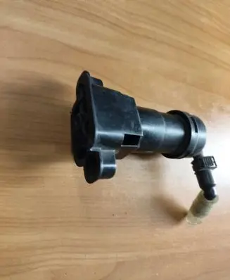 Headlight washer spray nozzle