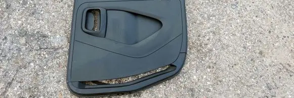 Coupe rear side trim panel