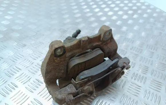 Opel Zafira B Front brake caliper 